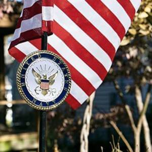 veteran grave marker with US Navy medallion