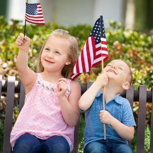 Children waving American flags